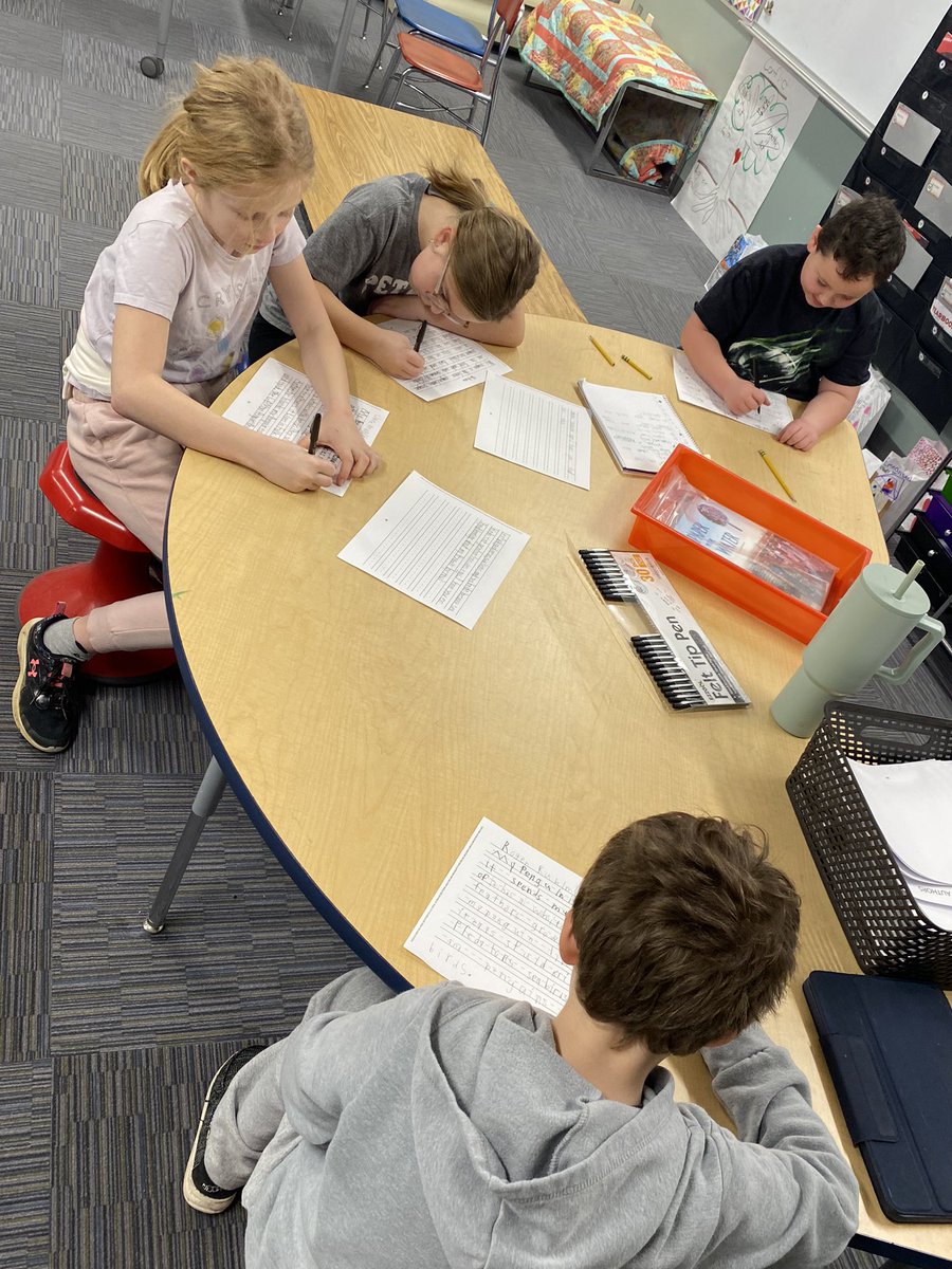 Authors at work! We are publishing a book all about penguins.