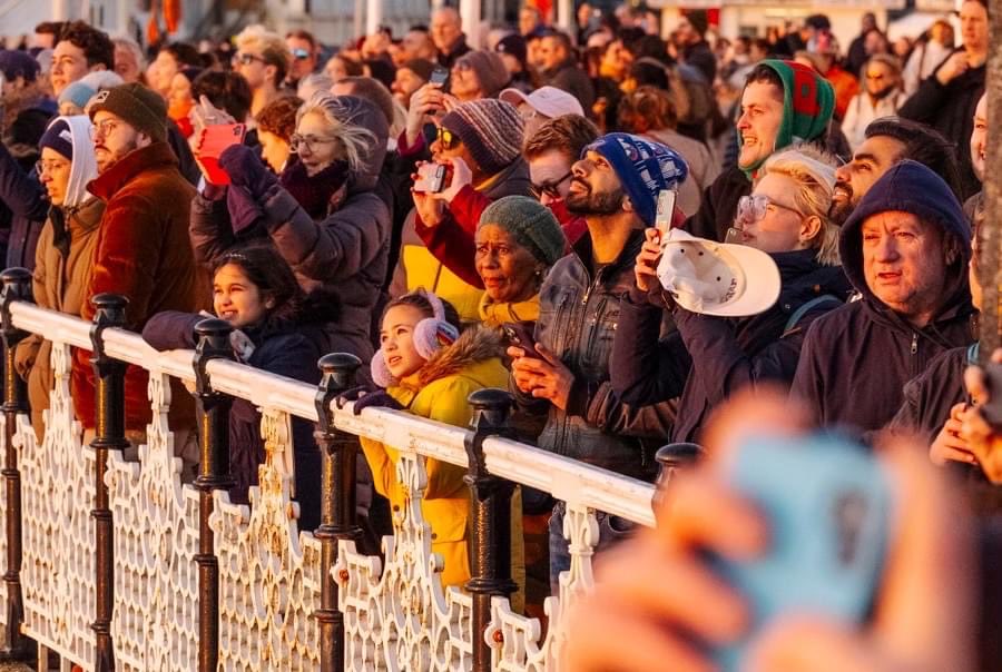 Watching the flight of the Starlings from the Brighton Palace Pier.