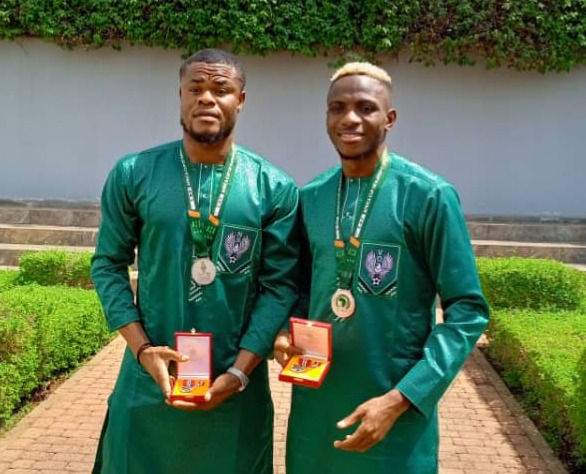 Nigeria's Super Eagles have been given plot of lands, flats and national honours for finishing second in the AFCON. Each Player will receive a plot of land in Abuja and a flat. The Team members were also conferred with the honour of Member of the Order of the Niger (MON).