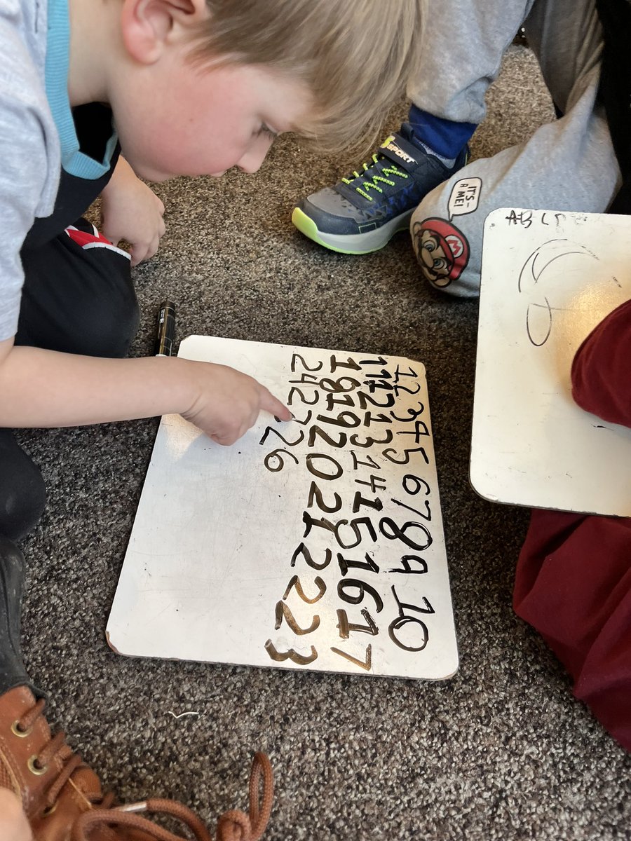 MissCStark's tweet photo. Self correction during numeracy! This independent student decided to practice his numbers. After reading the numbers aloud, he recognized that he made a backwards 5 in 25. He self corrected and was so happy! #EYvolunteering @EY_uwindsor https://t.co/6dp5IOiLjv