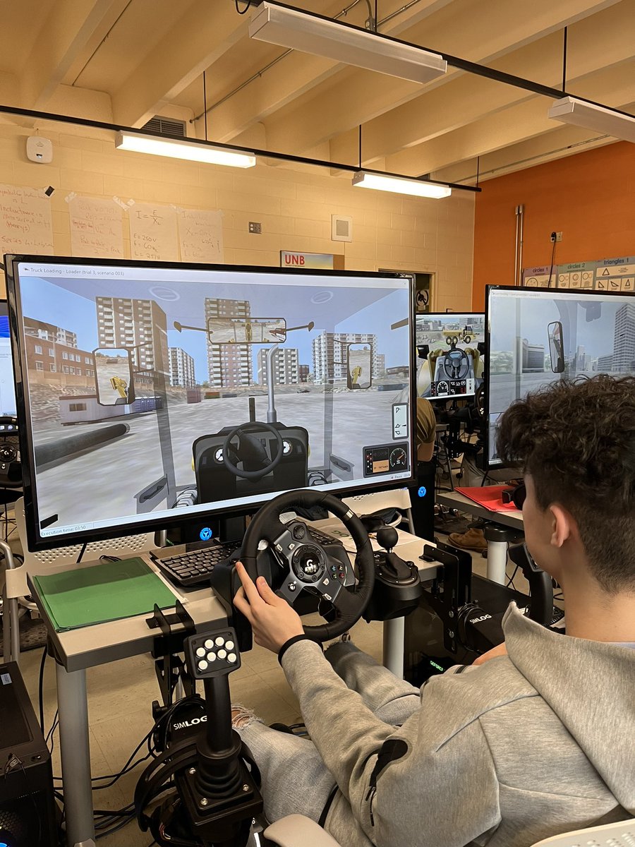 Simonds_HS's tweet photo. Thanks to #EECD and #communityconnection our students are fully engaged in Roadbuilders simulation training. Moving rocks, Learning to use a forklift, Digging a trench! #CoOp #futureisbright #jobready https://t.co/EkKv3q9VJb
