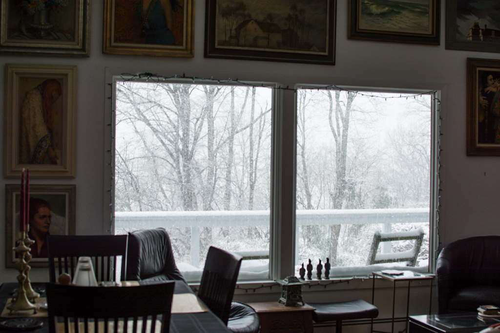 This morning...my living room. Above, some of my mother's paintings.