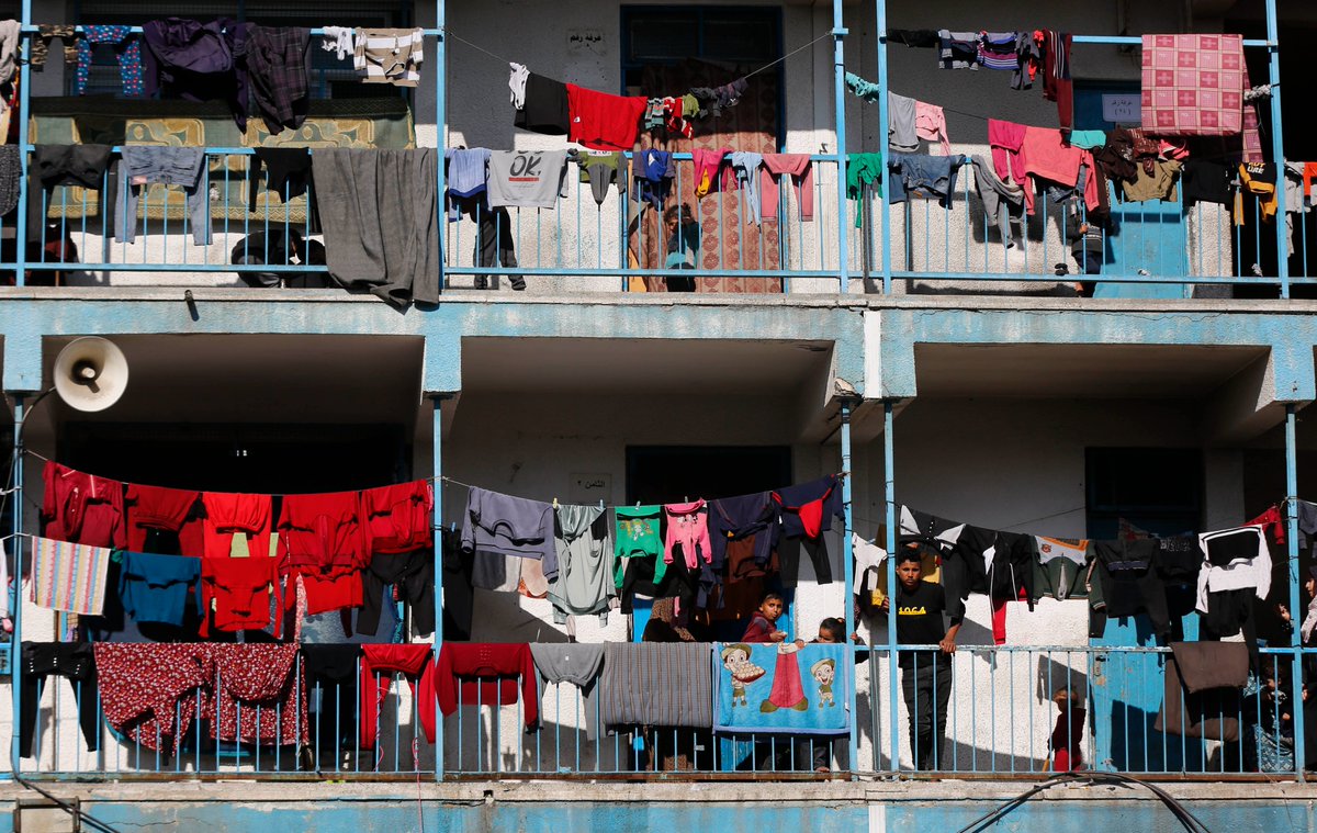 UNRWA's tweet photo. As brutal war and displacement continue, over 2 million people in📍#Gaza depend on @unrwa for survival.

@UNRWA runs shelters for +1 million people &amp; provides critical humanitarian aid, as well as primary healthcare - even at the height of hostilities.

Nobody else can do this. https://t.co/QlhMYvSwMQ