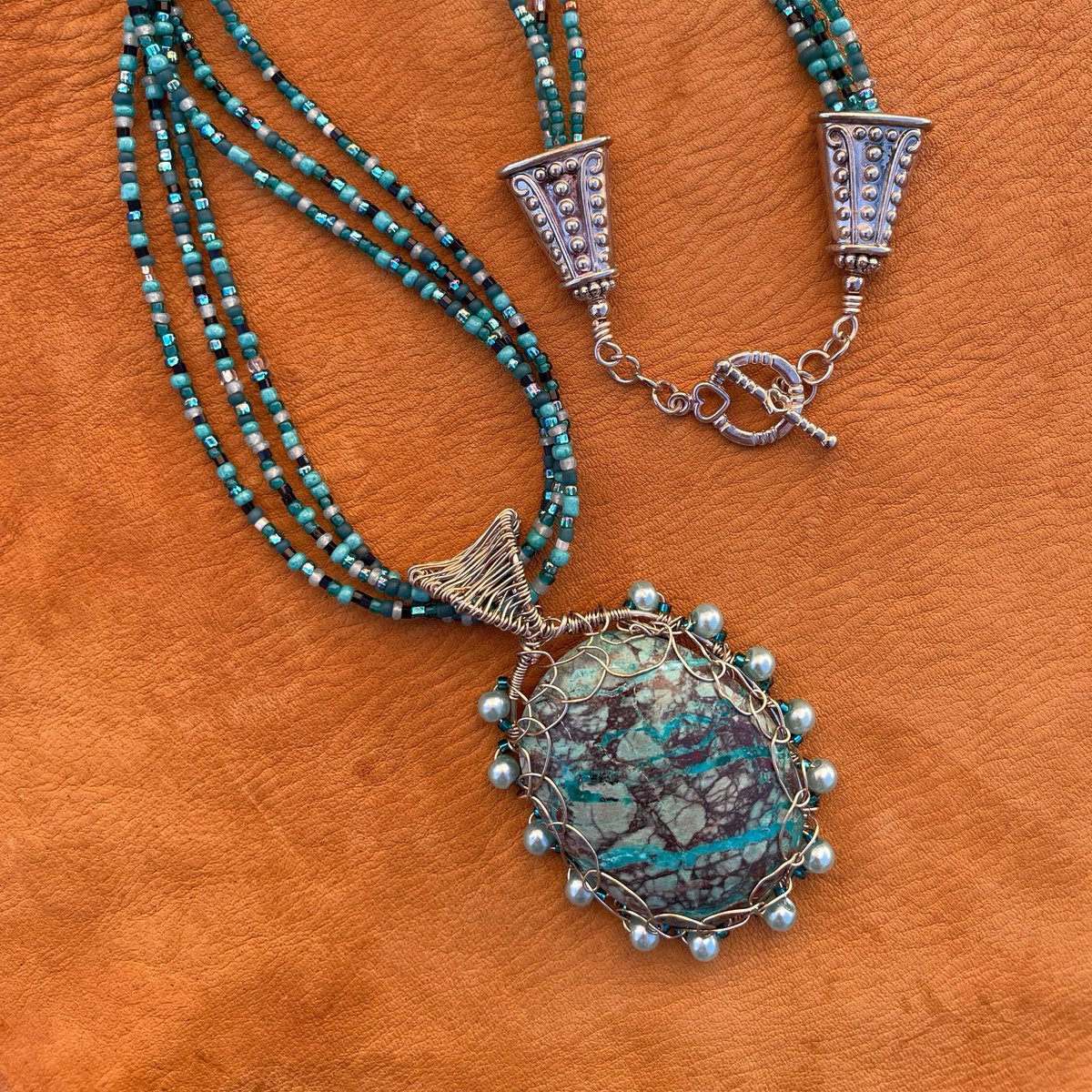 DesertDabbler's tweet photo. A statement necklace that I hand wove and added glass pearls. Use GIFTMODE code to get $5 off. https://t.co/Lhpz1zS2T7  #Etsy #handmadejewelry #chrysocolla #wirewrappedstone https://t.co/zUR06ZQlCl