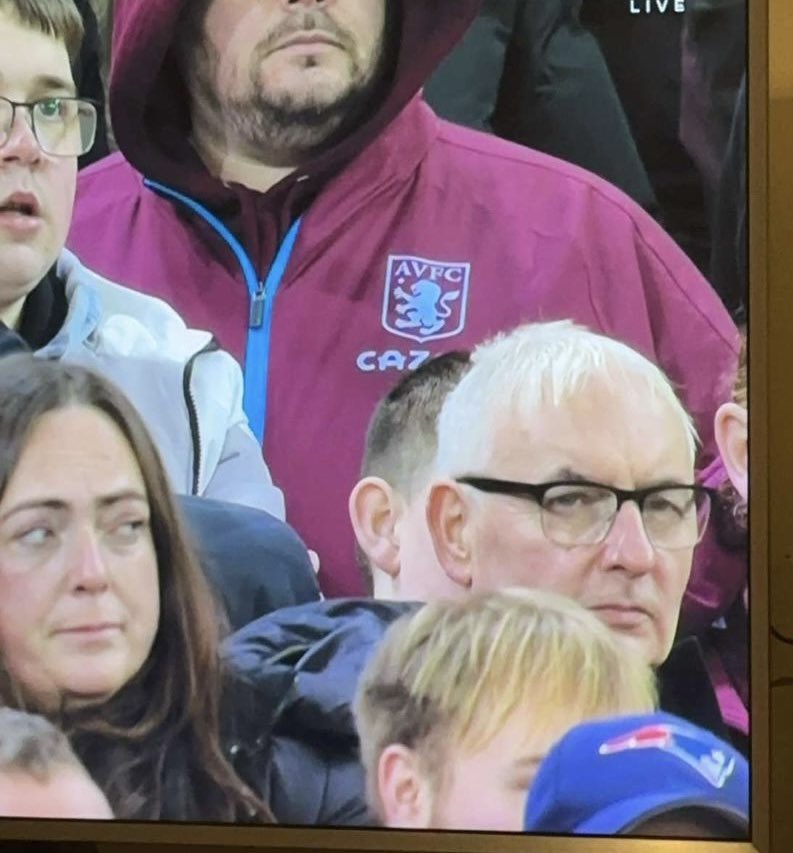 fossil_music's tweet photo. Our bassist caught on camera not looking too happy at the villa/manutd match, our manager however was stood the other side of him avoiding the camera whilst smirking at the result 🤣 https://t.co/zYD1bQE0sL