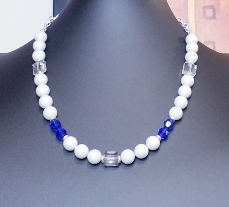 The luxurious Nia Necklace adds sparkle to any style. Created with Swarovski Majestic Blue Crystal and Pastel Grey pearls, this knockout will make a statement wherever you go. #sandalomadesigns #swarovskicrystals
#wearsandaloma #Jewelry #fashion #Jewellery #necklace #handmade