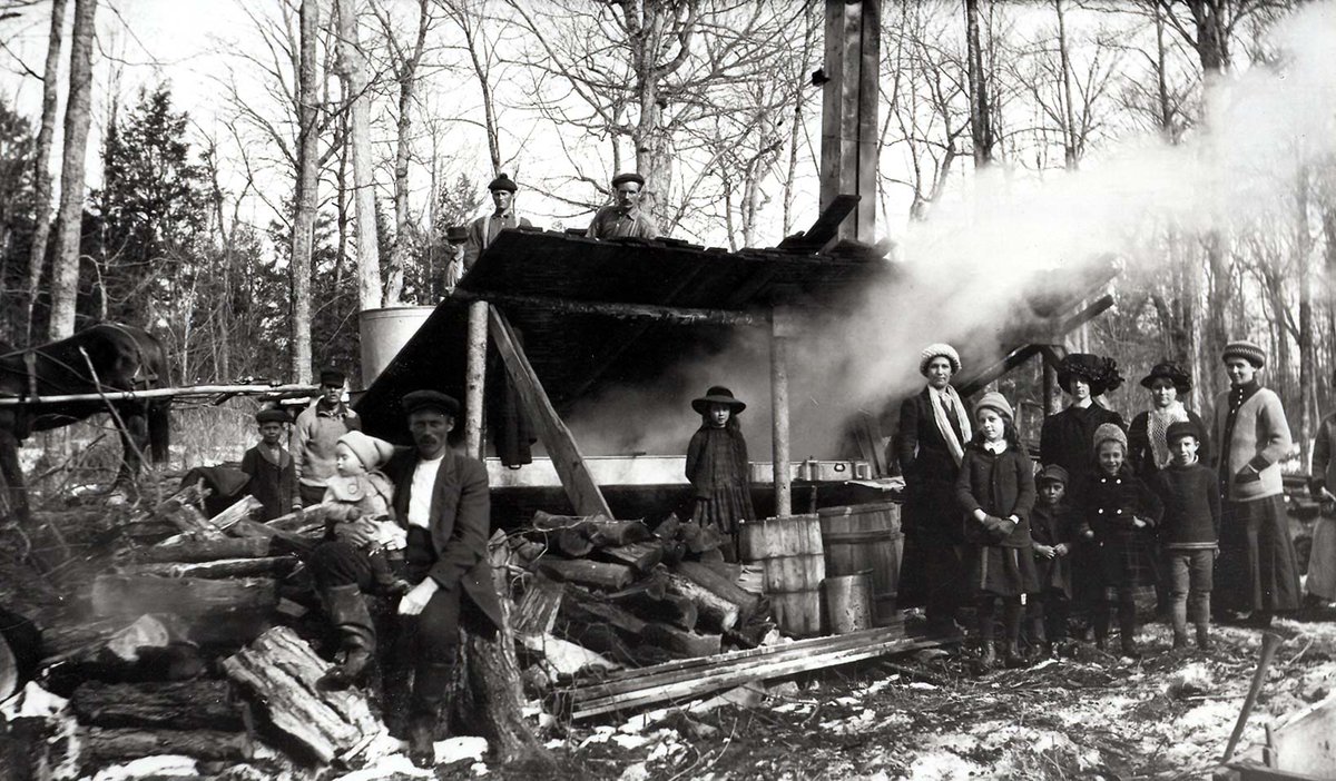 Who's making pancakes for Shrove Tuesday today? We don't have any photos of people making pancakes in our collection, but here's a pic of people making pancake toppings! Taken on the Walling family's farm around 1910, it shows the family's maple syrup shack.