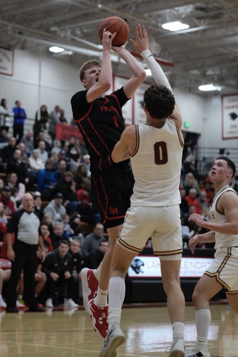 Panthers knock off the Cougars in a great rivalry battle.  @LNHoopsOx <a href="/LNHS_Panthers/">Lakeville North High School</a>