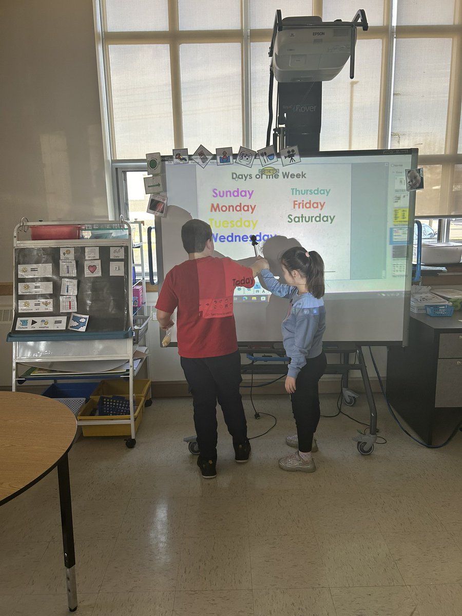 Gainsclassroom's tweet photo. J helped N point to the days of the week during calendar!  It’s so nice when they help each other out! https://t.co/COp0GCmSQ3