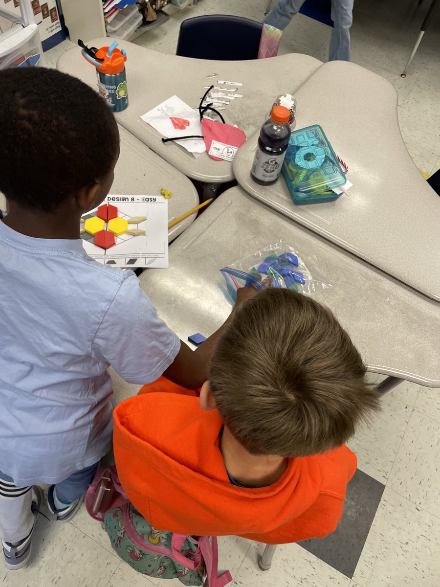 BethKF1966's tweet photo. Making symmetrical designs with pattern blocks   Good times in second grade #ccesdukes. #WeAreCuCPS https://t.co/dRJTUfOUSr