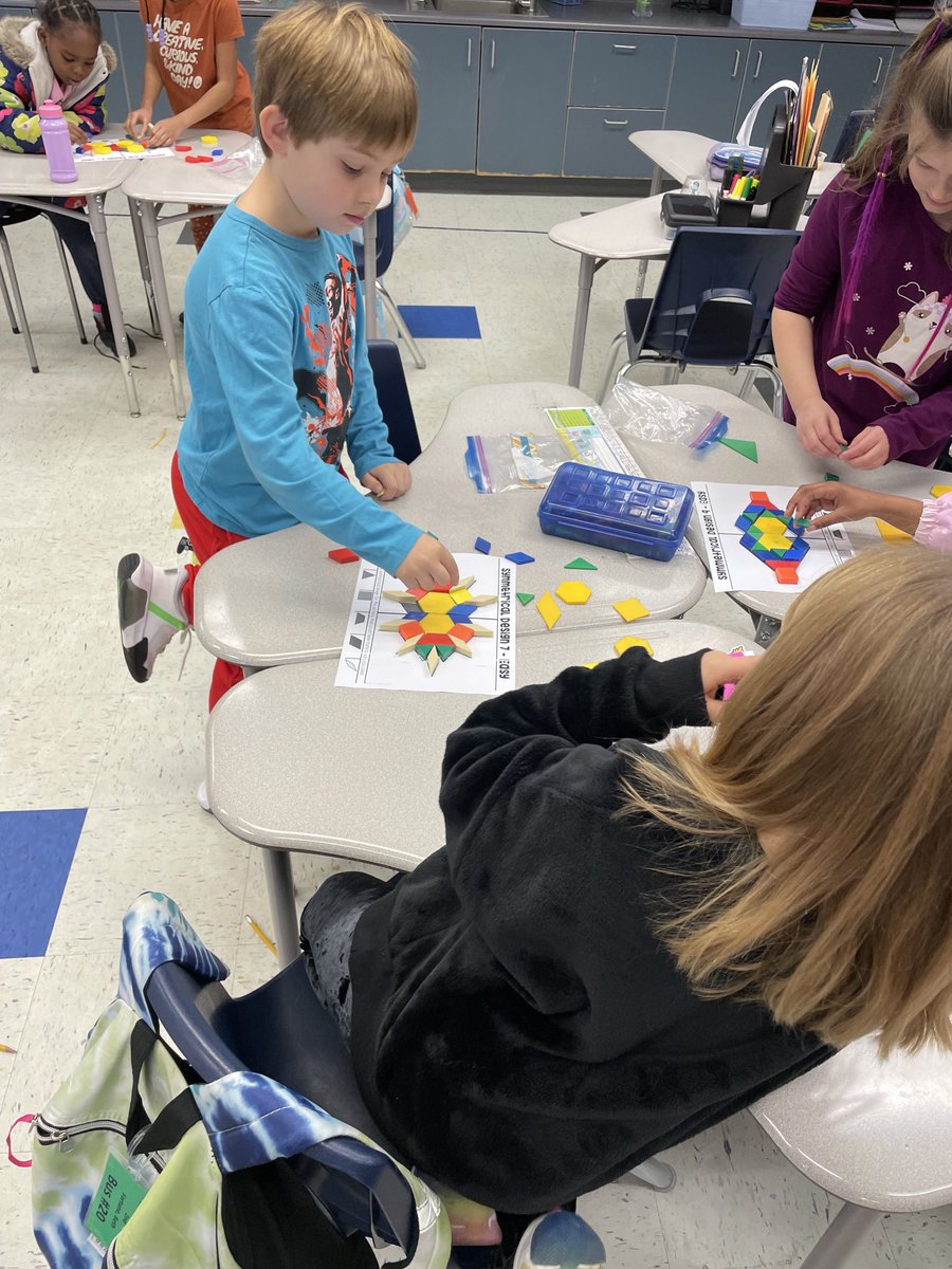 BethKF1966's tweet photo. Making symmetrical designs with pattern blocks   Good times in second grade #ccesdukes. #WeAreCuCPS https://t.co/dRJTUfOUSr