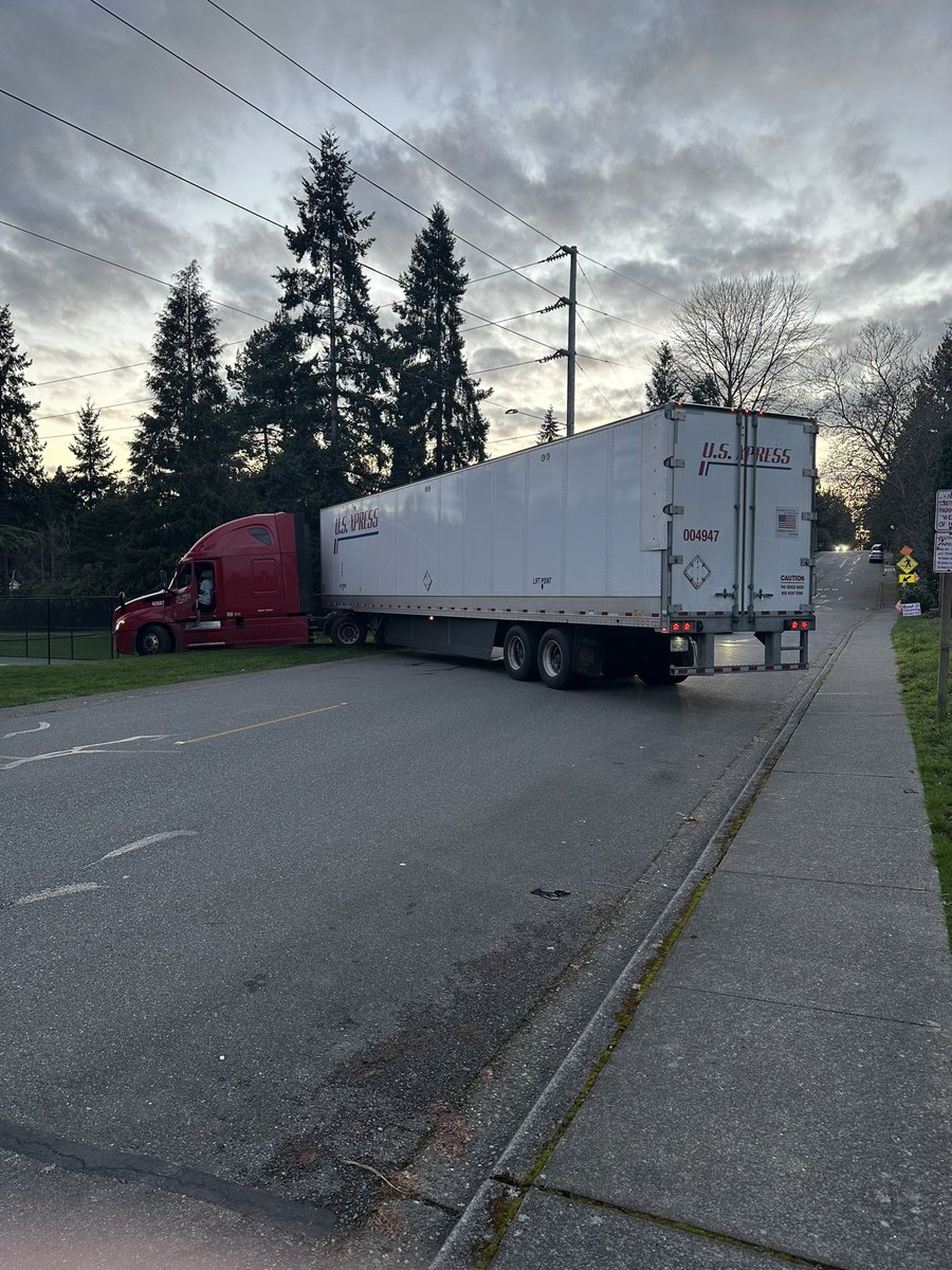 MedinaPoliceWA's tweet photo. @MedinaPoliceWA officers are currently on scene at a semi truck and trailer that became stuck in the ground in the 8200 block of NE 12th Street. Both directions of NE 12th Street are currently blocked. There are no safety concerns and we hope to have the roadway clear shortly. https://t.co/k7ZomUKWiJ