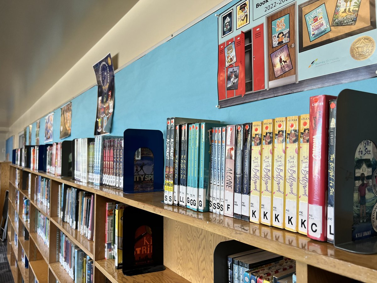 Mrs__MacDonald's tweet photo. A big-picture-thinking visit to KBWoodward #LLC with #sd36tl Mr Powell, reimagining his space for soft/flex seating + NF shelving. Plus, a great idea to house past #SSBOY noms with their posters! And some  amazing hallway #BHM and LunarNY displays #sd36learn https://t.co/iTtOUGBnnF