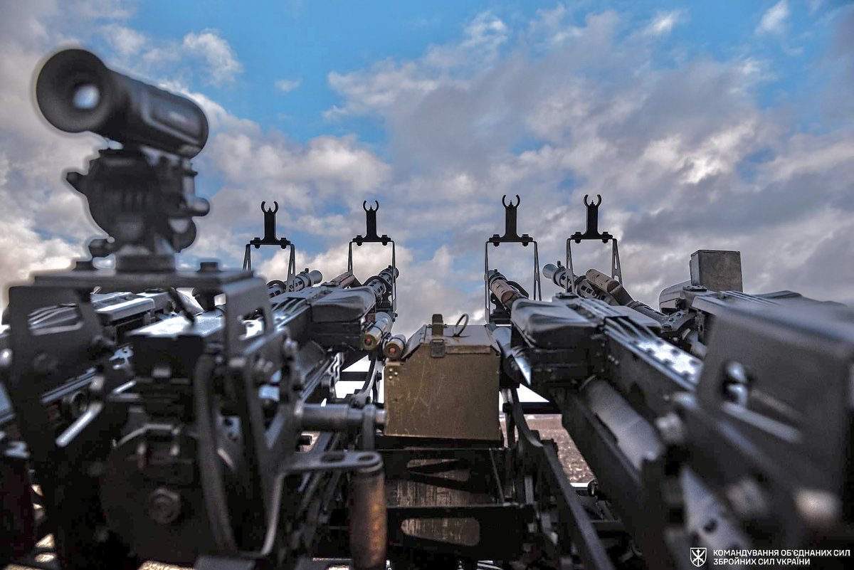 View from the turret of an anti-drone technical in Ukrainian service, sporting four KPV 14.5mm heavy machine guns and a thermal sight.