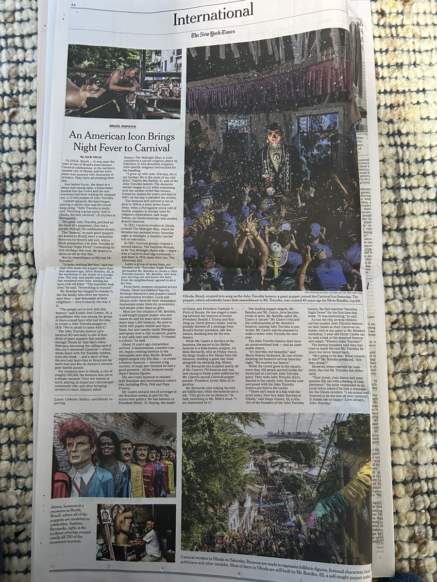gugachacra's tweet image. Reportagem de uma página sobre os bonecos gigantes do Carnaval de Olinda na capa da parte de Inter na edição impressa do NYTIMES. O texto é do correspondente @jacknicas