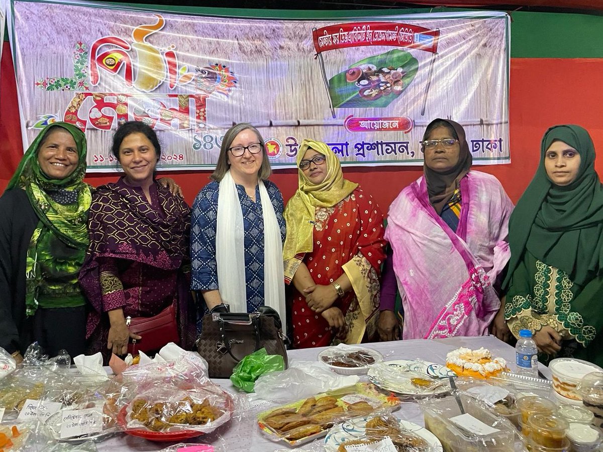 CarersWorldwide's tweet photo. Our Development Director @RuthPatil is in Bangladesh, to launch the research project 'Balancing Act' in collaboration with @queensu

She joined some #unpaidcarers who'd been invited to sell baked goods at a #community event. A lovely way to spend her first day in Bangladesh 💜🧡 https://t.co/yYXYBmv9w8