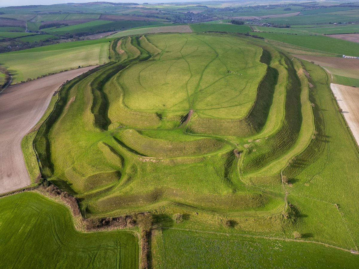 Maiden Castle, near Dorchester. Europe’s largest Iron Age hill fort. A pavlova on the landscape.

#hillfortwednesday #ironage #MaidenCastle #dorset #dronephotography #britainfromabove #aerials #djimini3pro