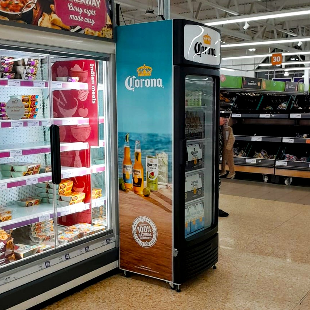 HuskyCommercial's tweet photo. Thrilled to unveil our latest collaboration with AB InBev and Sainsbury’s! Discover in our latest article how our bespoke Corona-branded Husky Refrigerators are enhancing shopper's experience: https://t.co/SupaYrm084 https://t.co/5q8VVZVQNw