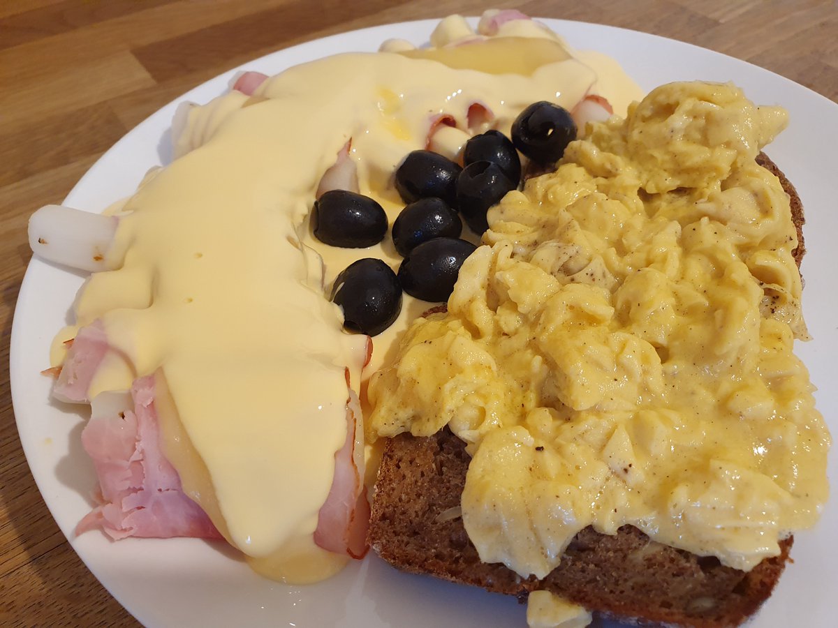Most important meal of the day, apparently. Salsify with (supermarket) hollandaise and scrambled eggs on rye. (S)