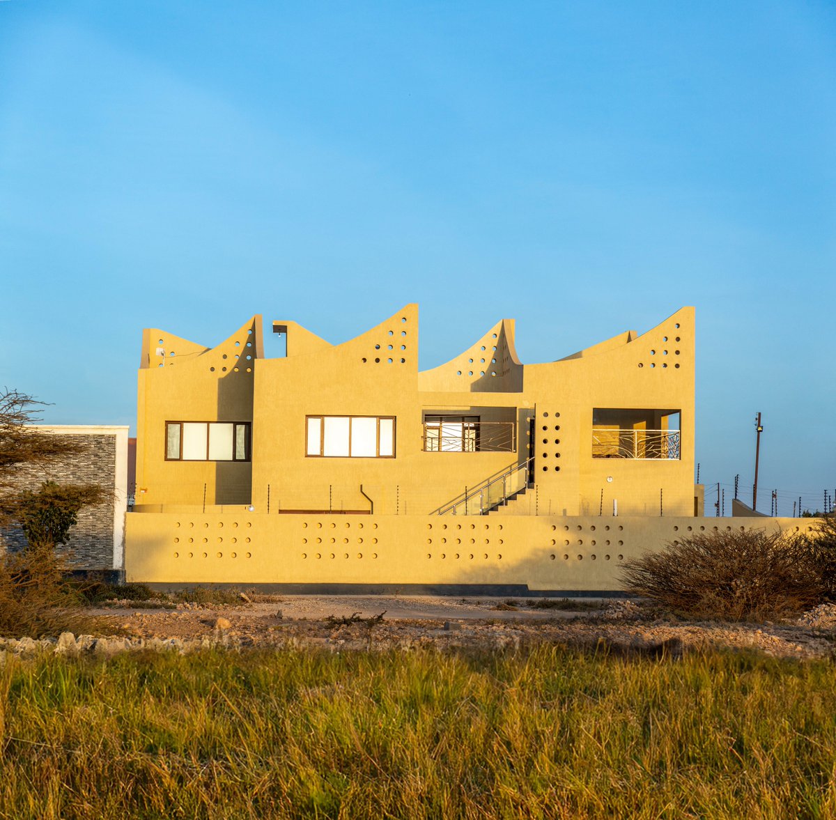 omar_degan's tweet photo. #Africa and #Architecture 
I am really happy to share one of my latest architectural works located in Hargeisa. This house has been meticulously crafted with a focus on harnessing natural ventilation to optimize weather conditions while minimizing energy consumption. The design features multiple courtyards strategically integrated into the layout, allowing for seamless airflow and a harmonious indoor-outdoor connection. The curves of the roofs draw inspiration from the nearby Gulf of Aden, mirroring the gentle waves that grace the shores of Berbera daily. This project was made possible through the unwavering patience and dedication of the homeowners, who envisioned not just a comfortable retreat but a source of inspiration for the entire region.