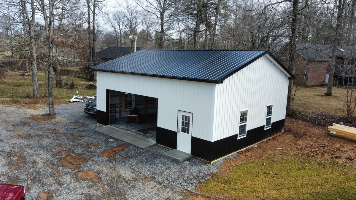This sharp, black and white garage is almost complete! Just waiting on a garage door to finish up!

#garage #polebarn #postframeconstruction #shop #storage #clarksvilletn #middletennessee #westernkentucky