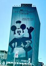 Billboard of @NoelMacNeal 'helping' Steamboat Mickey with John Oliver on Sunset Boulevard! @iamjohnoliver #LastWeekTonight #Disney #MickeyMouse