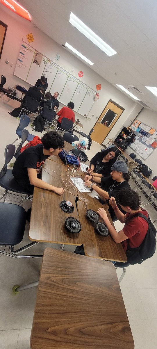 AutoHarlan's tweet image. Students learned how to read basic electrical schematics and are demonstrating how to properly hook up a radio.