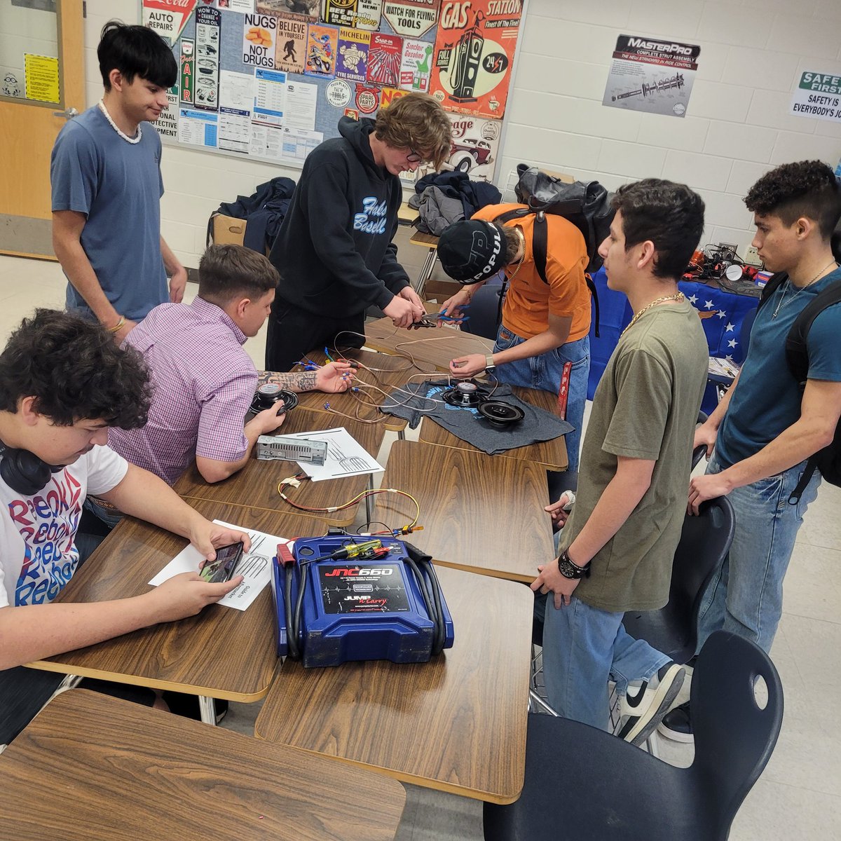 AutoHarlan's tweet image. Students learned how to read basic electrical schematics and are demonstrating how to properly hook up a radio.