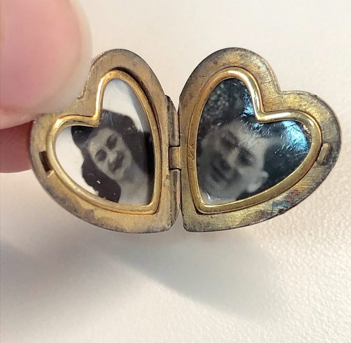 MuhlenbergSpC's tweet photo. This 1940s locket featuring the @Muhlenberg seal was an eBay find a few years ago. Who were these long-ago sweethearts? ❤️
#valentinesday #antiquelocket #collegearchives https://t.co/JGtOYSD2fi