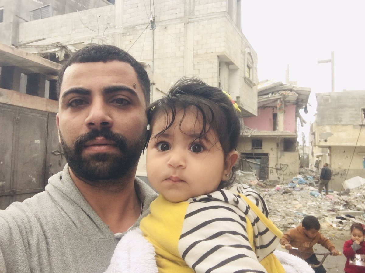abdazizmo7amd's tweet photo. My daughter Aylol sends you love and peace from Gaza and behind her this destruction https://t.co/hJhu46oegN