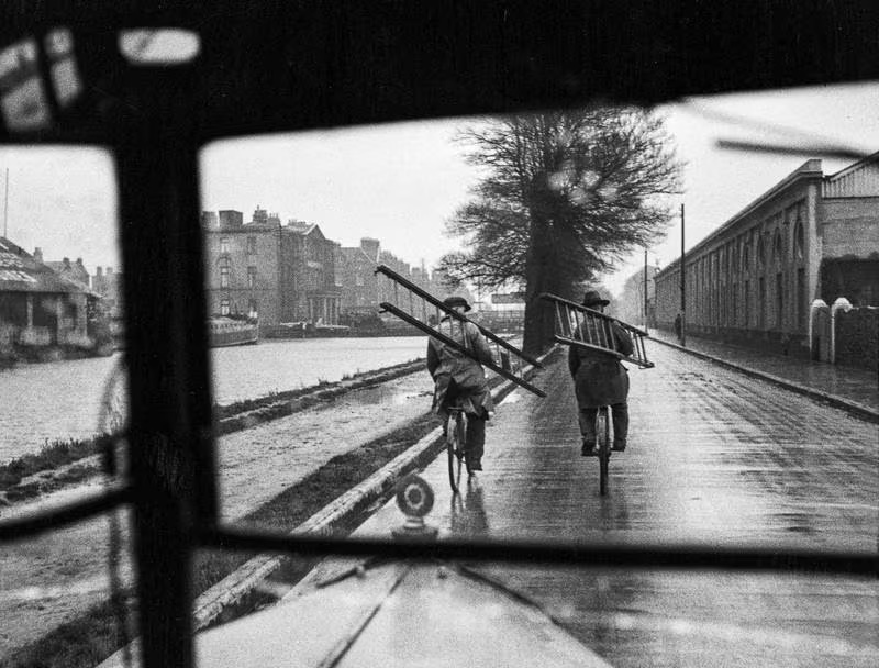 A photo taken through the windscreen of a motor car in 1928. Taken while driving alongside the Grand Canal at Portobello. Up ahead is the Grand Canal Hotel (now the Portobello Institute) Photograph: Fr FM Browne SJ #vintagedublin #visitdublin