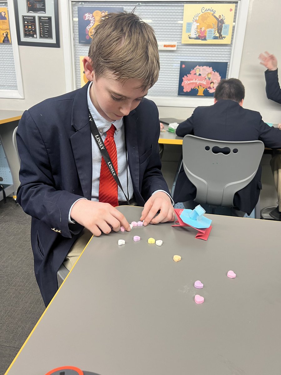 LinslyIT's tweet photo. Building off a lesson with Mr Holt, 5th Graders created origami jumping frogs and engineered a basket that would have to stay on as the frogs jumped around and collect Valentine heart messages in STEAM! 🩷🩵🧡@linslyschool https://t.co/KHK3V2WGM0