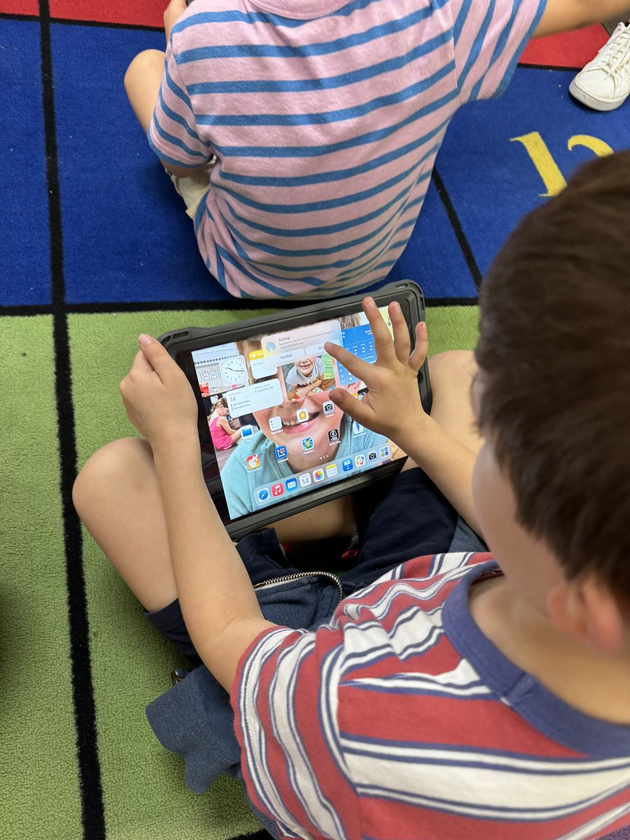 lindsaybcross's tweet photo. I’m so impressed by the students in Mrs. G’s class! @katgracea led an intro on #Keynote where students turned on AirDrop, accepted the file, wrote their name, added &amp; animated shapes in their math problem. Kinder kiddos CAN do hard things! #RISDWeAreOne @MPEPanthers @AppleEDU https://t.co/TNZVTyMOjY