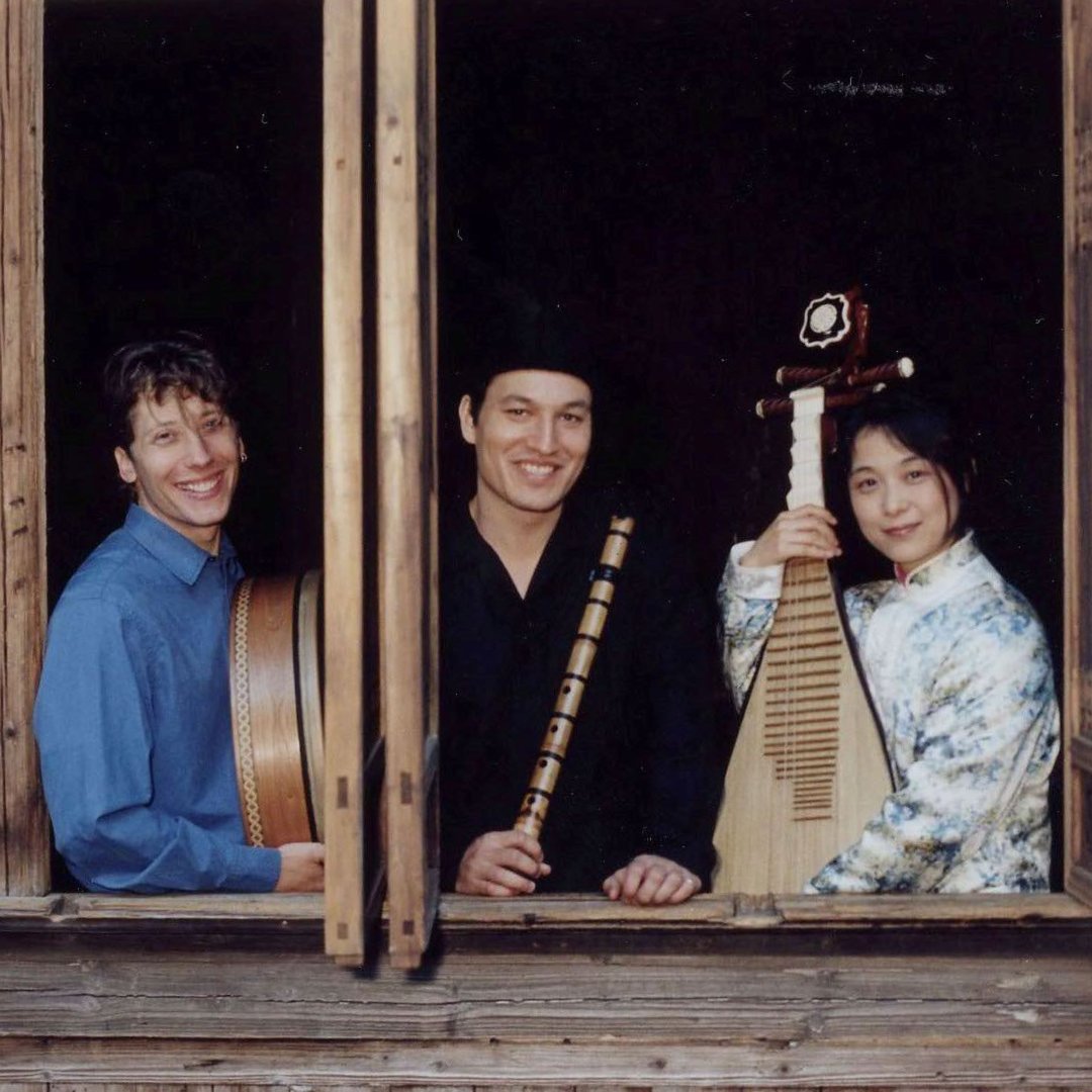 Let's rewind to the early days of Silkroad! Check out this photo from 2003 featuring (from left to right) Shane Shanahan, Kojiro Umezaki, and Wu Man attending one of our very first education programs during a museum residency at Peabody Essex Museum, MA. #SilkroadHistory