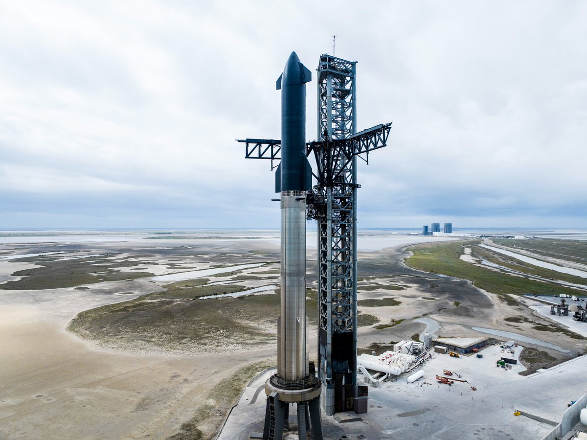 Four SpaceX rockets vertical on SpaceX's four launch pads in Florida, California, and Texas