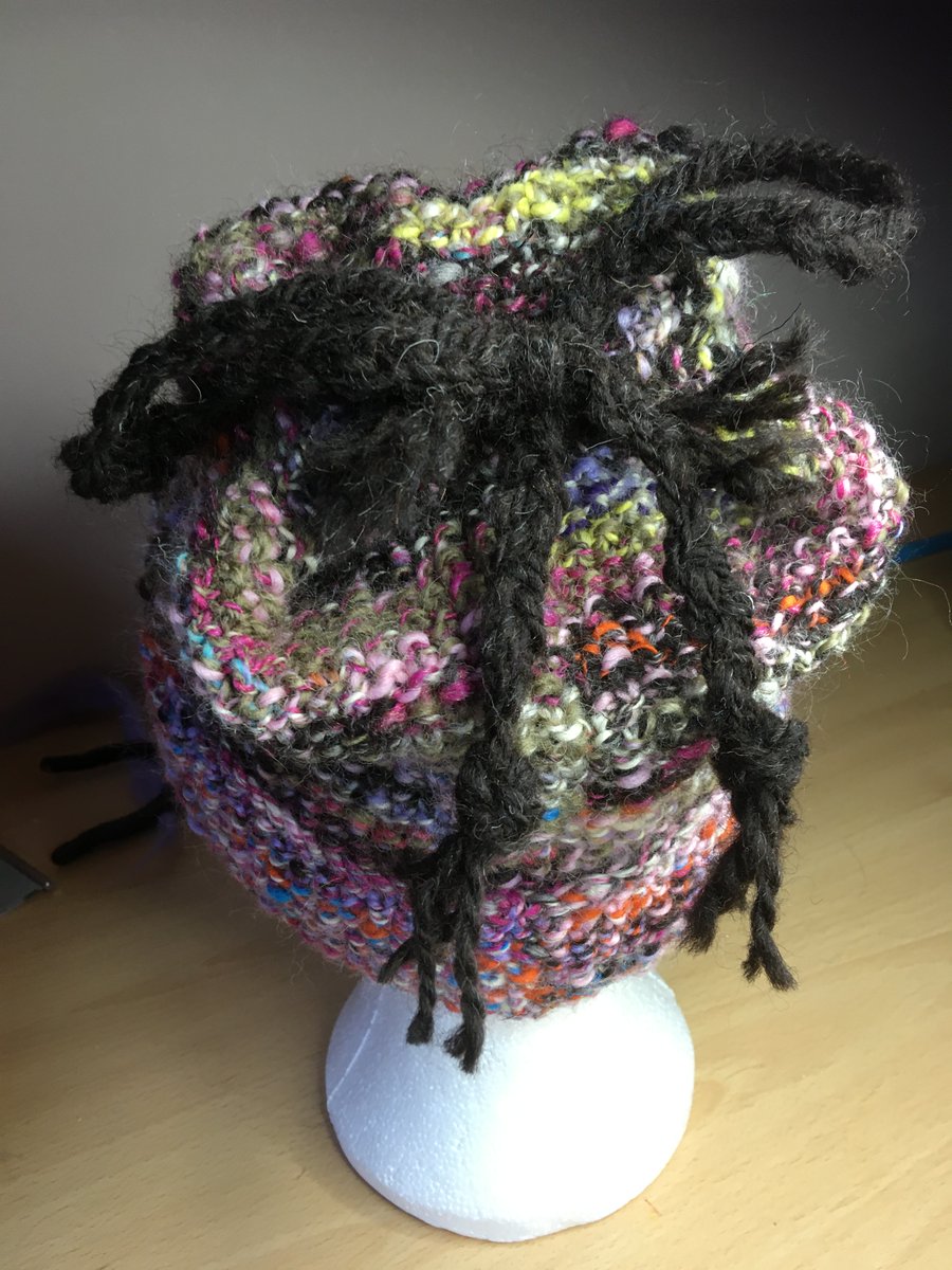 Hi, Another hat, same pattern a different colour. If you would like to wear one message me or price