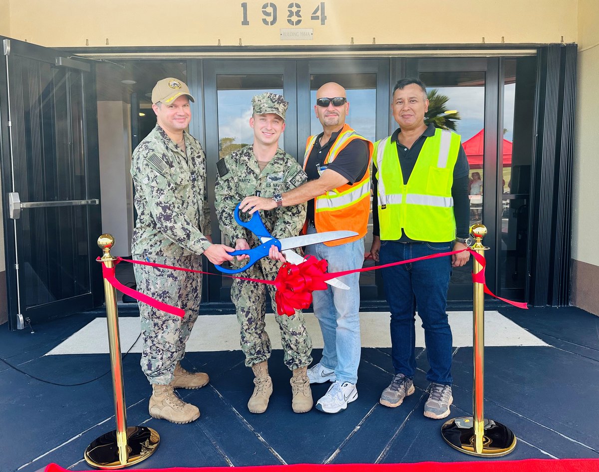 NBG CO Capt. John Frye, Chaplain Daniel Swartz, and contractors cut the ceremonial ribbon to kick off the re-opening of the NBG Chapel onboard NBG, Feb. 2. The chapel underwent a $1.5 million repair following significant damage from Typhoon Mawar.