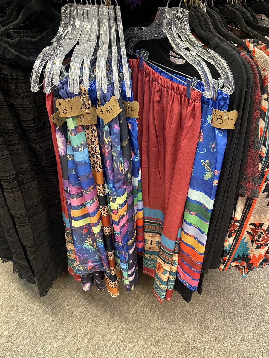SwiftbirdNDN's tweet photo. If y'all need some more colonizer fuckery today. I went into a "western" style store in the mall today and found they were selling shitty knock off ribbon skirts there. Not only is the fabric super shitty, the ribbons are just printed on as part of the pattern 😭💀 https://t.co/DH3pXQKgLK