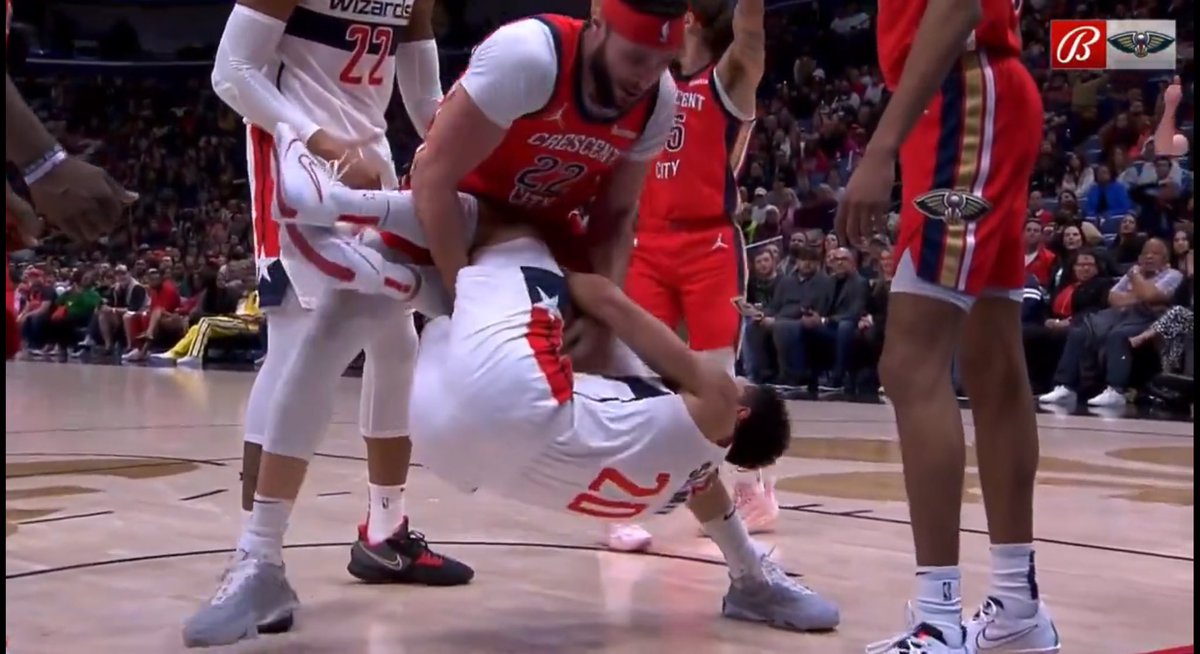 Me trying to get the 28 lb bag of dog food into the cart:
