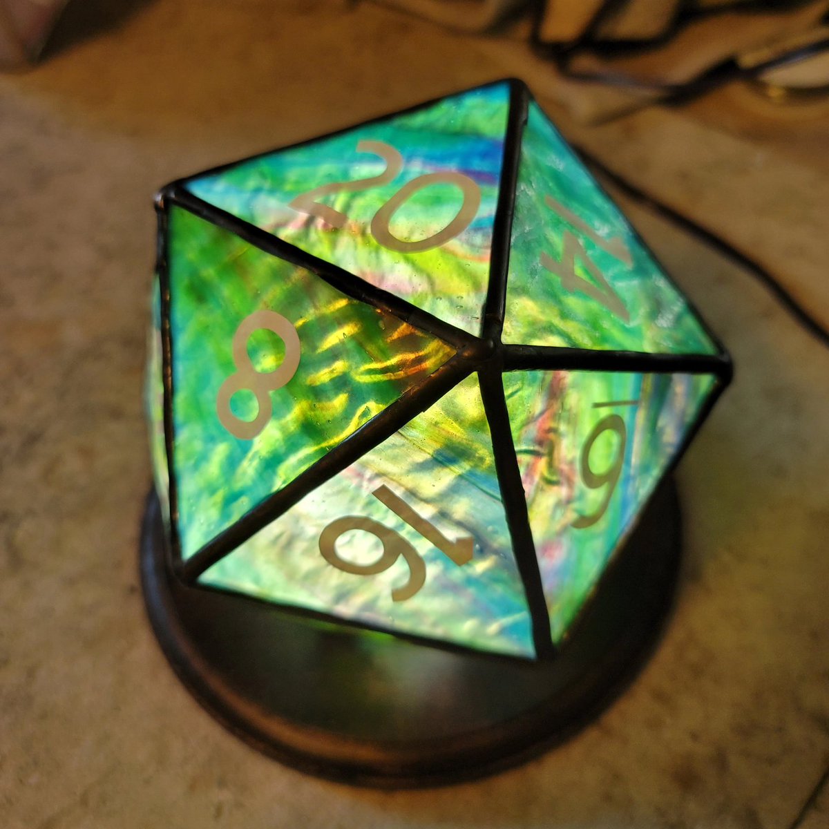 PrismtreeStudio's tweet photo. Elegant, unique,  super nerdy. Just some of the things your friends will say about a custom #d20 #stainedglass #lamp from us!  We make to order and have many many colors available.  Visit us on etsy in bio. https://t.co/3XHdnb5wb8
