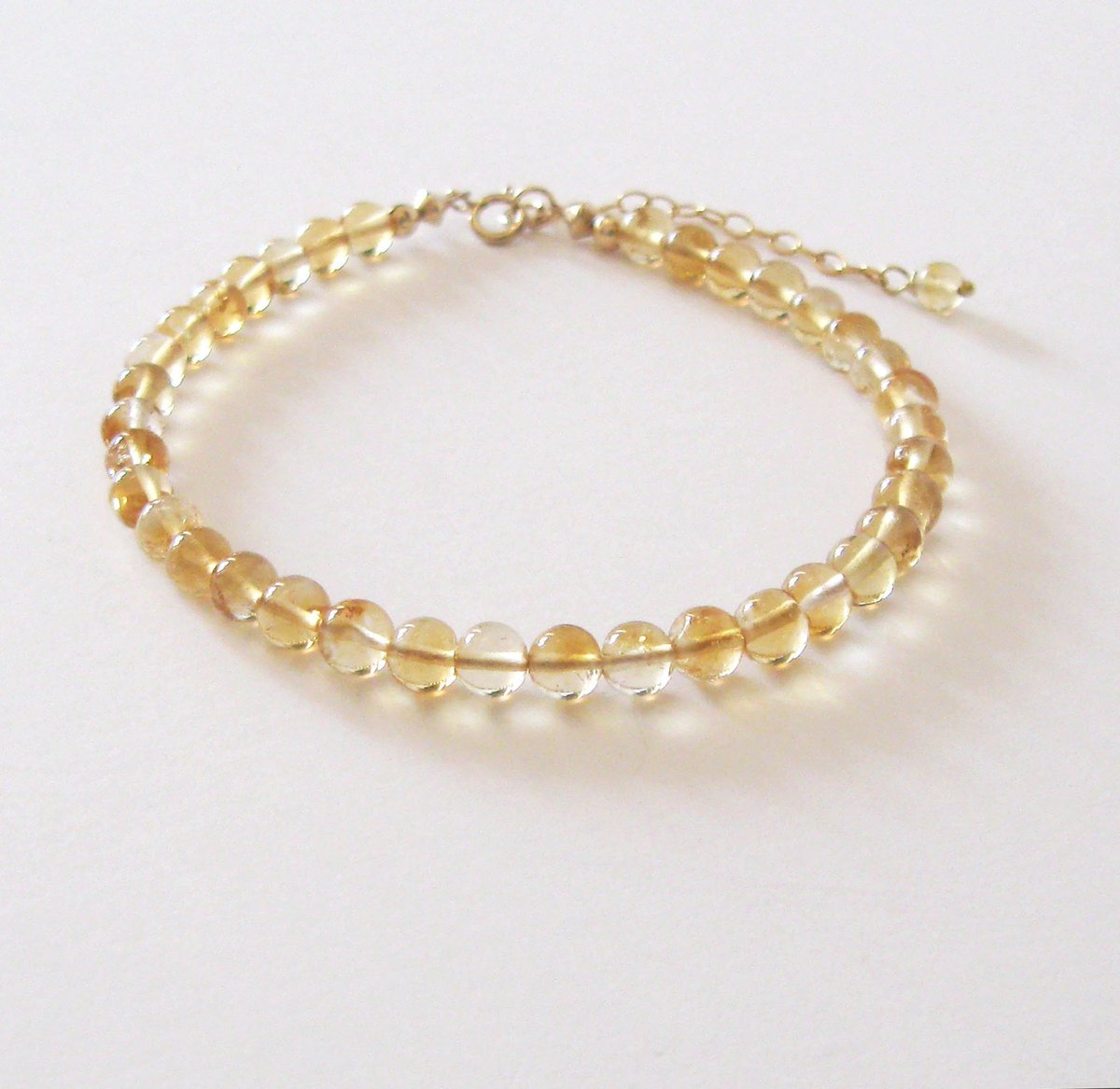 sendinglovegems's tweet photo. Citrine Gemstone Goldfilled Adjustable Bracelet, Tiny 4mm Beads Clear Yellow Stones, Prosperity and Joy, November Birthstone, https://t.co/0aLIPP5tYf #SendingLoveGallery #Etsy #AuraProtection https://t.co/AHboxPSUXv