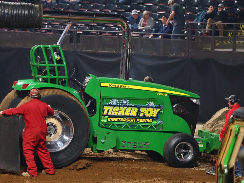 KYNFMS's tweet photo. The "Tinker Toy" John Deere piloted by Darryl Folz was in familiar territory, diving into the Freedom Hall sandpile for the win in Pro Stock Tractor presented by Wimer Fuel Injection and Turbo. https://t.co/xd2SMym8xZ