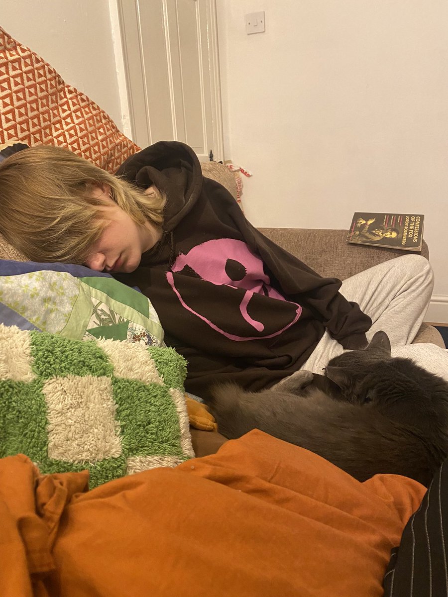 the best valentine’s days end with your date and your cat curled up asleep together on the sofa