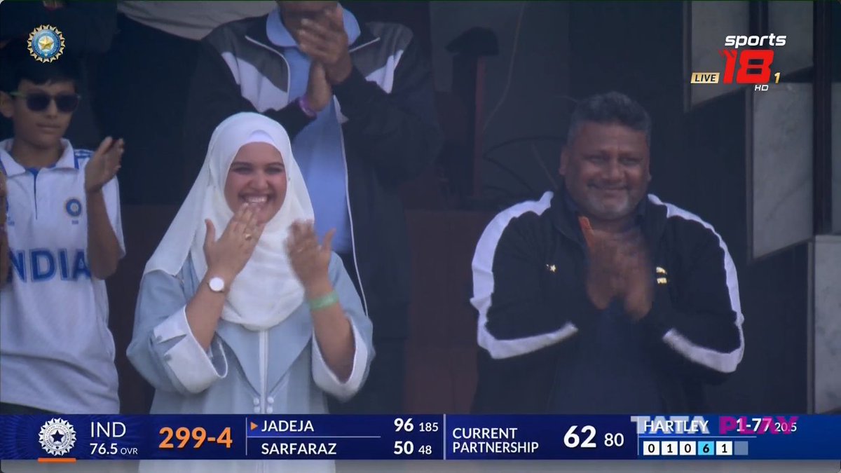 ❤️ The sheer joy radiating from Sarfaraz Khan's father and wife's faces is priceless. A heartwarming tableau of emotions that speaks volumes about the shared journey. #SarfarazDebut #FamilyCelebration 🏏🌟