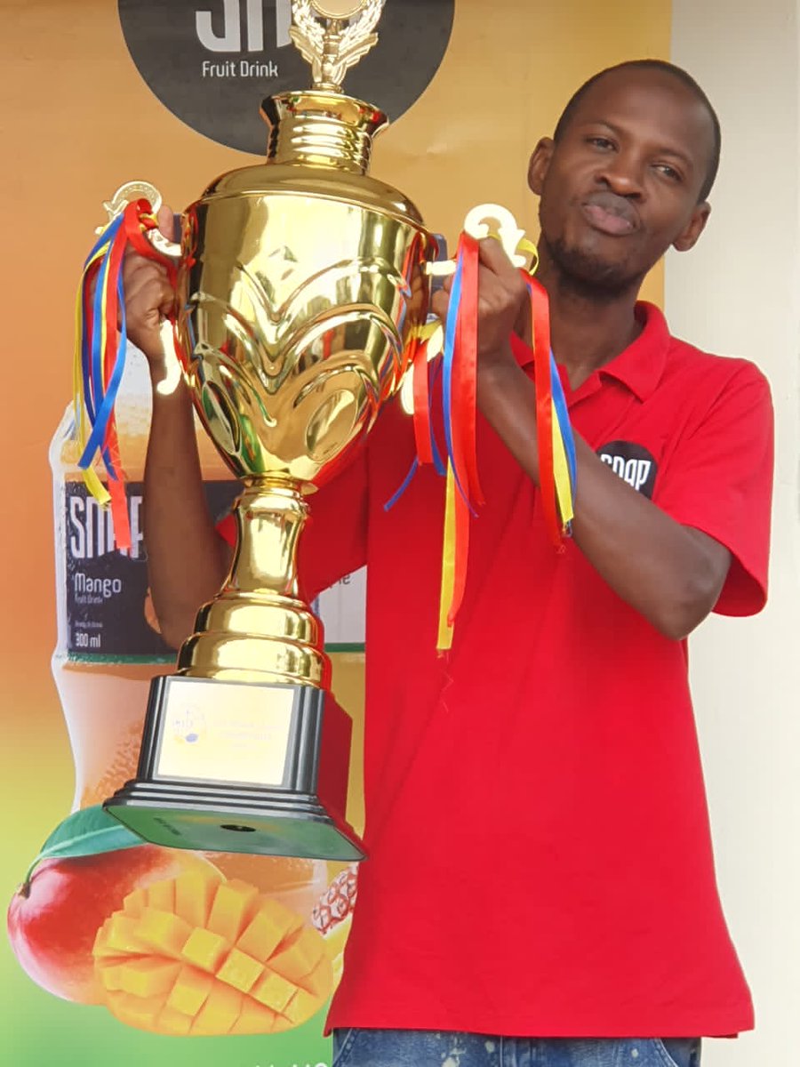 Still celebrating the @ZIMBAZ06 
emerging champions of @TheSMACKLeague.The trophy tour made a stopover at our offices. @KanunguJuiceMo @lukeeraelvis @moradio_ug @kasulekawooya @LegendsKla @smackists @soccanettug @Omukama3 @PajoshOgwal #TSL6