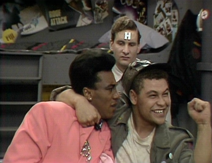 TheStarbug_club's tweet photo. "Look out earth, the slimes coming home!" 

36 years ago today we heard those famous words for the first time. Happy birthday to a show that means so much to so many. Let's celebrate today and get #RedDwarfStatusDay trending!  Urine recyc on standby! 🥂 #RedDwarf36 https://t.co/3jh3XNYVqq
