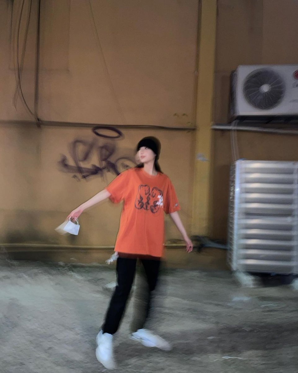 Sunshine vibes on a cloudy day. Orange tee like a ray of light piercing through the beanie's cool shade. ☀️ A reminder that even amidst chill nights or casual strolls, your inner spark shines through, warming the world with positivity and good vibes. ✨