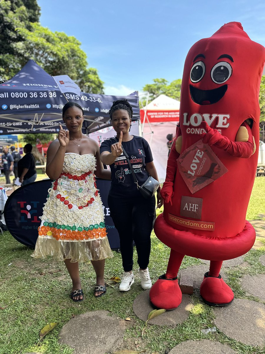 CHWC, Ms. Nonkhanyiso Xaba, strikes a pose with Mr. & Miss Condom at the DUT Steve Biko Campus Orientation Programme for first-year students. This week serves as a vital reminder to prioritize sexual health, reduce STI transmission, and combat HIV. @DrBladeNzimande @RamneekHH