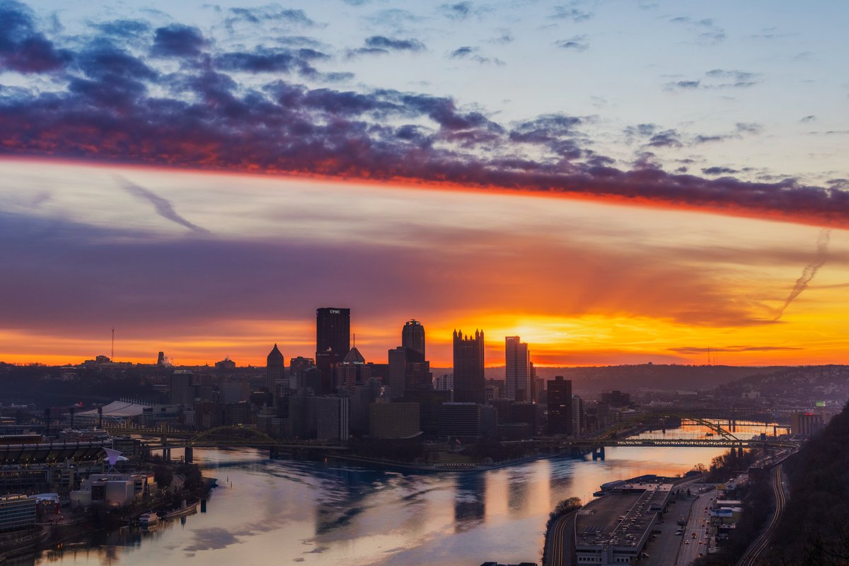 DaveDiCello's tweet photo. Quite the sunrise in #Pittsburgh today. After the really vibrant color began to fade another stretch of clouds rolled in and lit up as well. It was almost like shooting two completely different sunrises in one morning, which is always fun. Some early favorites, but more to come. https://t.co/EZD840xuoI