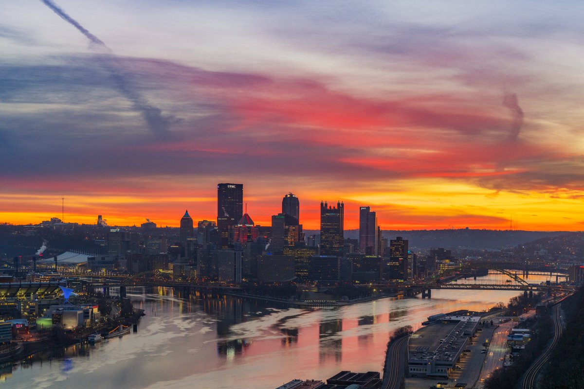 DaveDiCello's tweet photo. Quite the sunrise in #Pittsburgh today. After the really vibrant color began to fade another stretch of clouds rolled in and lit up as well. It was almost like shooting two completely different sunrises in one morning, which is always fun. Some early favorites, but more to come. https://t.co/EZD840xuoI
